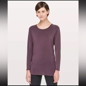 Lululemon burgundy long sleeve workout shirt with slit at the back in size 12